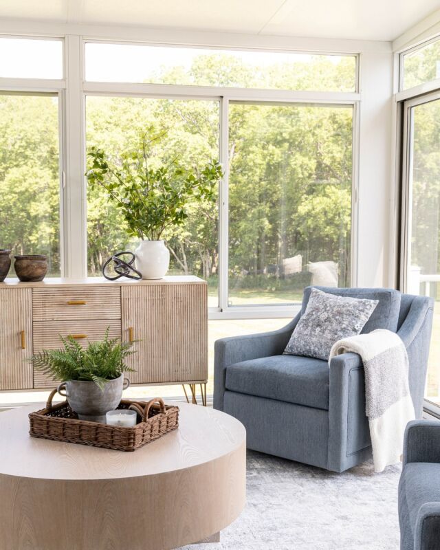 Look at this gorgeous new three-season sunroom – pretty sure I wouldn't move from that cozy couch all weekend. 

We've been working our way through updating this stunning house on the prettiest piece of property, and are in love with how this new space turned out. The perfect spot to enjoy the changing weather with complete climate control! The best part of these rooms is you can use indoor furniture that is comfortable enough to spend all day lounging on. Swivel chairs are also the perfect choice for this room, so you can easily turn toward the couch for a conversation or swivel around for the outdoor views. 

From there we moved on to the laundry room and updated it with gorgeous green cabinets. I think having a pretty and functional laundry room makes such a difference. I can't wait to share the next few rooms on this pretty tour!

TDC Designer | @miles3_17 
Furniture + Styling | @homeatlastco 
Custom Cabinetry | @customwoodproductsks
Photography | @emmahighfill